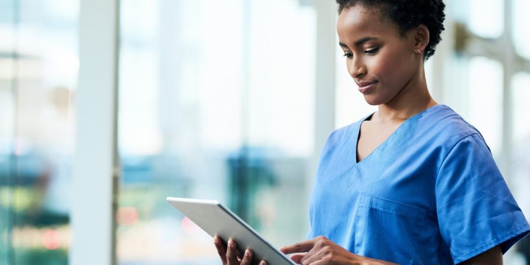 Shot of a young medical practitioner using a digital tablet in a hospital