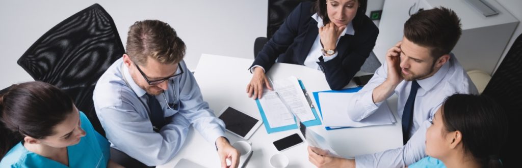 doctors and business people in a meeting