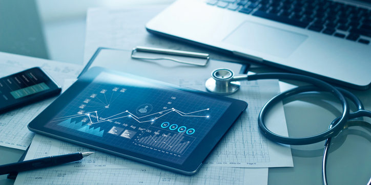 Healthcare business concept, Medical examination and growth graph data of business on tablet with doctor's health report clipboard on background.